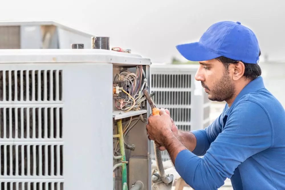 Technician carrying out an appliance repair